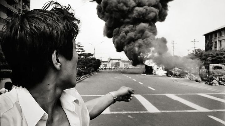 smoke-rises-from-a-burning-car-during-a-riot-near-tiananmen-squ-data